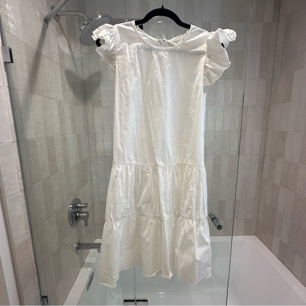 White mini dress with ruffle sleeve